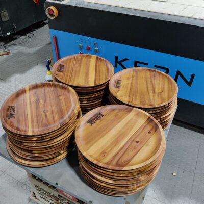 Production laser burned wood plates