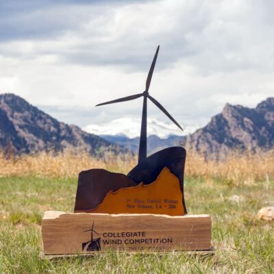 Custom award - Sandstone, patina steel and laser etch